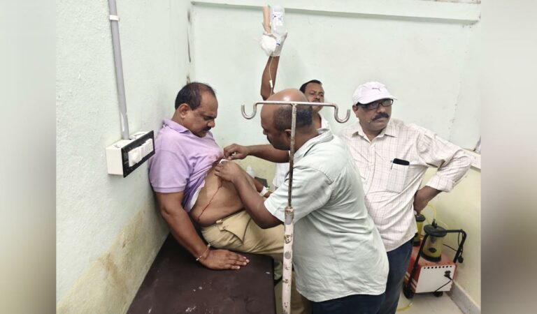 Drunk man attacks police in Nirmal.