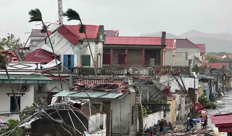 Houses are damaged in the aftermath of typhoon Bualoi in Thanh Hoa, Vietnam.