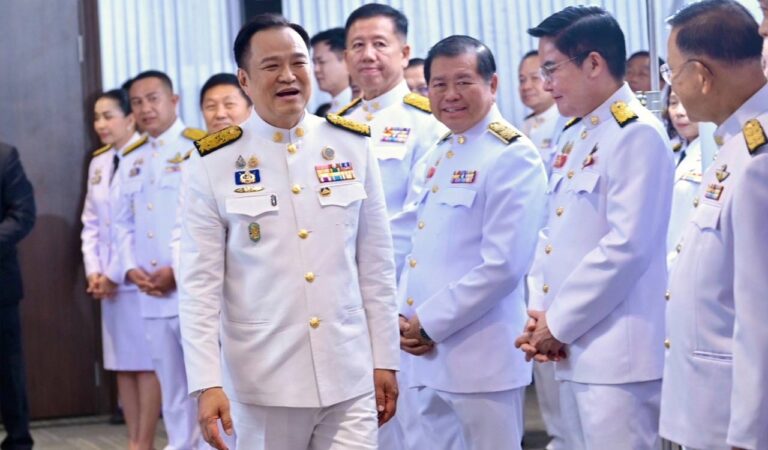 Thailand's new Prime Minister Anutin Charnvirakul talks to Bhumjai Thai lawmakers at Bhumjai Thai party Headquarters after receiving a royal endorsement in Bangkok, Thailand.