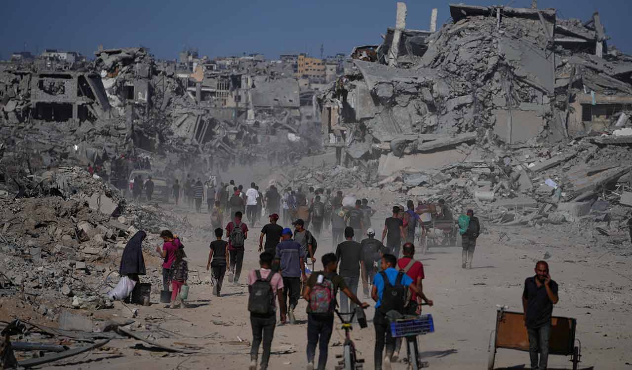 Thousands of Palestinians return to shattered homes as Gaza ceasefire takes effect