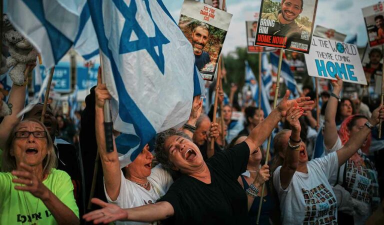 People gather at a plaza known as the hostages square in Tel Aviv, Israel, on Oct. 13, 2025, prior to the release of Israeli hostages held in Gaza.