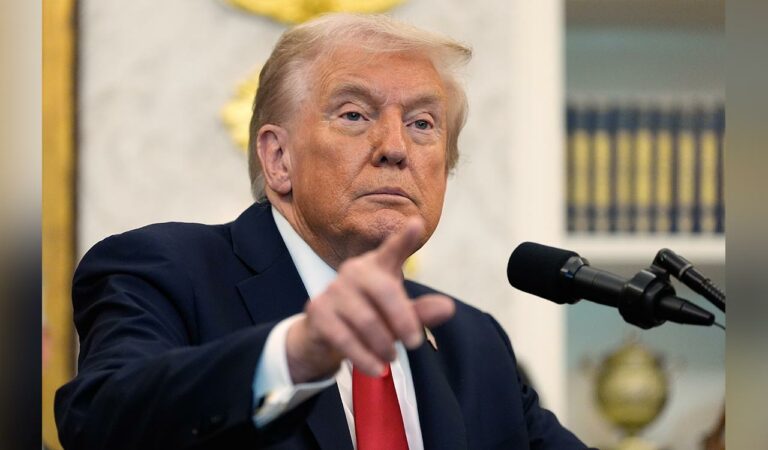 President Donald Trump speaks in the Oval Office of the White House, in Washington.
