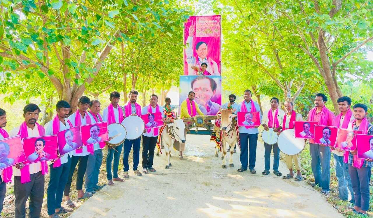 Adilabad: Villagers perform Ksheerabhishekam to KCR’s flex poster ahead of Diksha Diwas