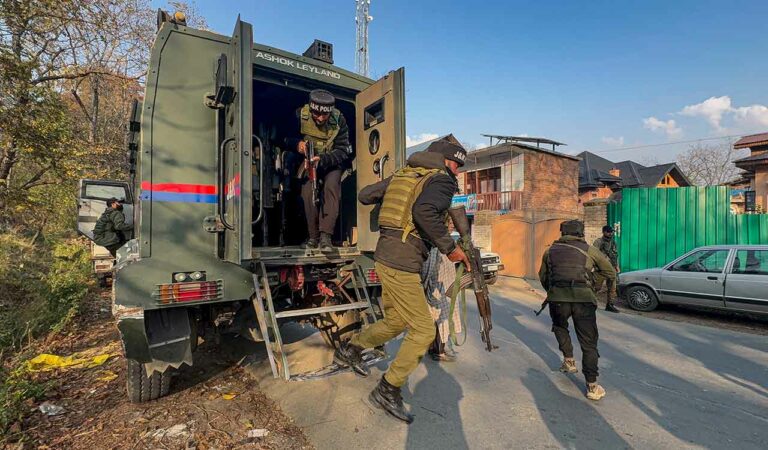 Security personnel conduct a raid on the residence of an operative of Hizb-ul-Mujahideen, in Anantnag district, Jammu and Kashmir.