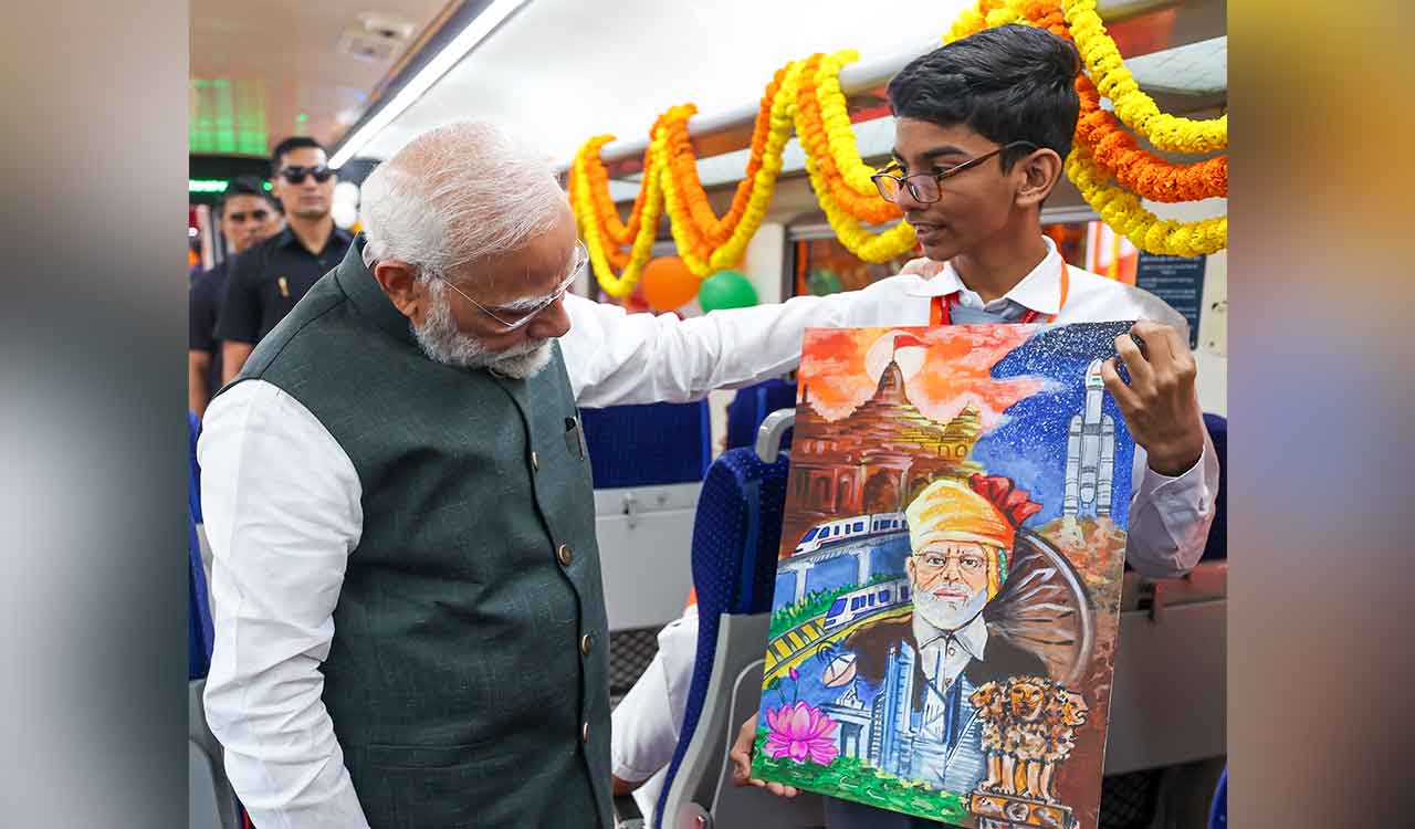 PM Modi interacts with students aboard Vande Bharat train in Varanasi