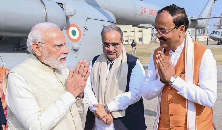 Uttar Pradesh Deputy Chief Minister Keshav Prasad Maurya greets Prime Minister Narendra Modi upon his arrival in Ayodhya ahead of the Dhwajarohan on Tuesday.