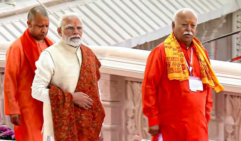 Prime Minister Narendra Modi with Uttar Pradesh Chief Minister Yogi Adityanath and RSS chief Mohan Bhagwat during the Dhwajarohan ceremony at the Ram Temple, in Ayodhya