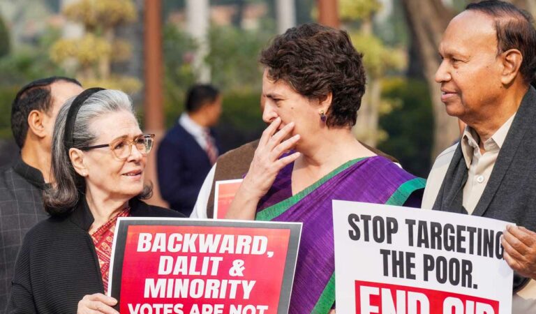 Congress leader Sonia Gandhi with party's General Secretary Priyanka Gandhi Vadra during a protest against Special Intensive Revision (SIR) outside the Parliament during Winter session, in New Delhi.