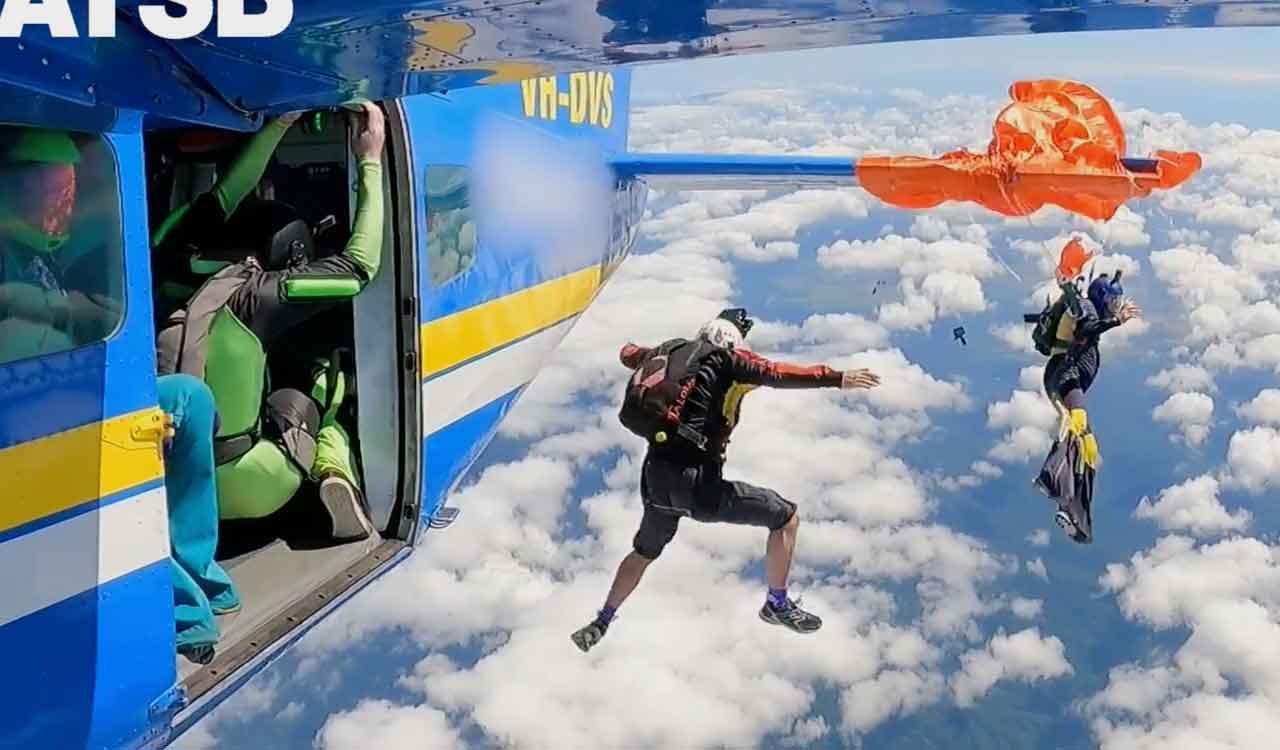 Australian skydiver dangles from plane tail; cuts free at 15,000 ft