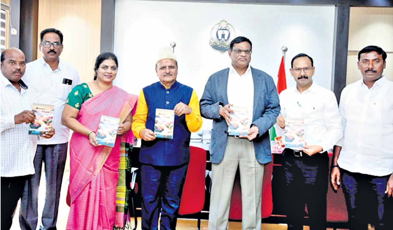 KU VC Prof. Pratap Reddy releases book ‘Rivers of Grace’ penned by Prof. Suresh Lal