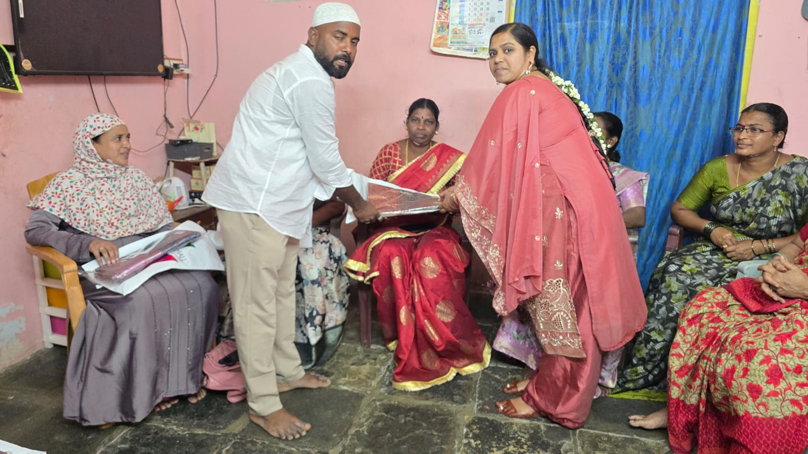 KMC corporator distributes clothes to workers on Eid-ul-Fitr