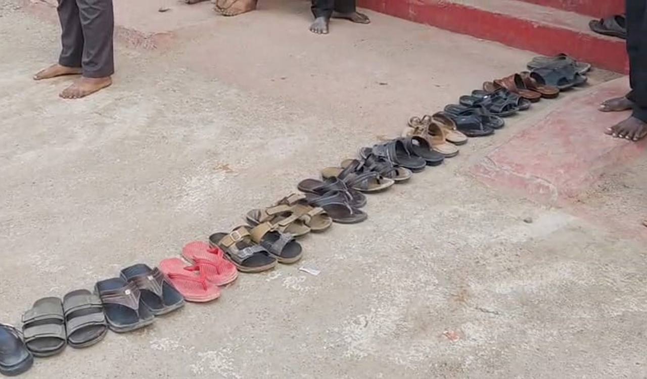 Panicked consumers place footwear to book LPG cylinders in Nirmal