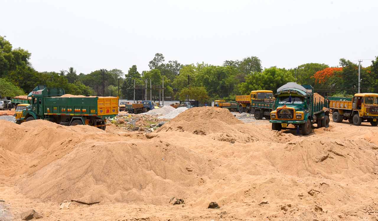 Sand lorry owners protest mandatory radium sticker charges in Telangana