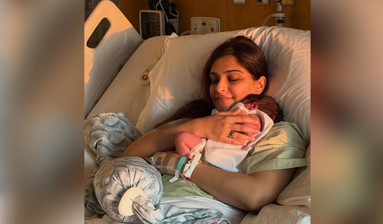 Sonam Kapoor shares first pic holding her newborn close to her heart from the hospital