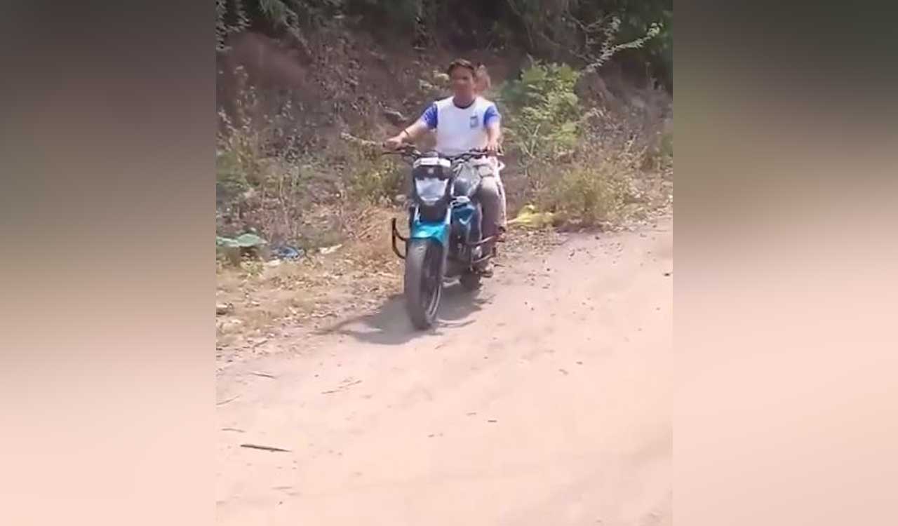 Man caught on camera while beating six-year-old daughter in the forests in Mancherial