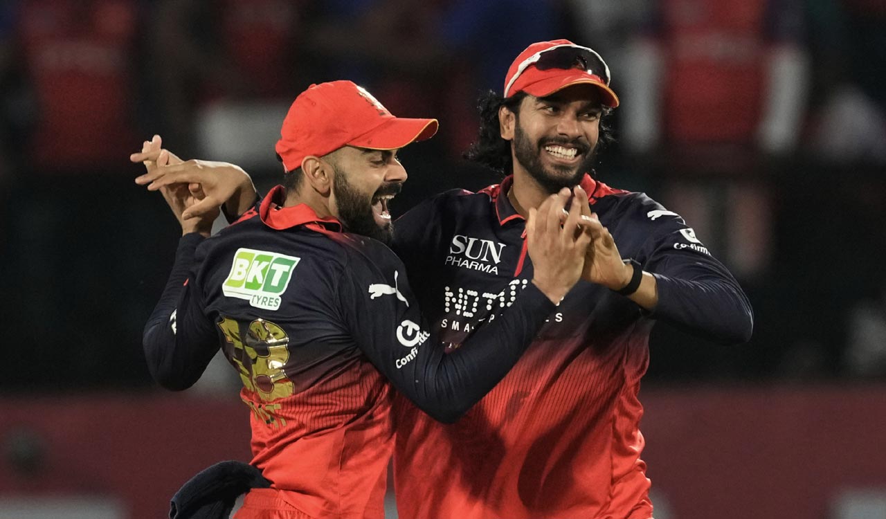 Royal Challengers Bengaluru clinch IPL playoffs spot with 23-run win over Punjab Kings