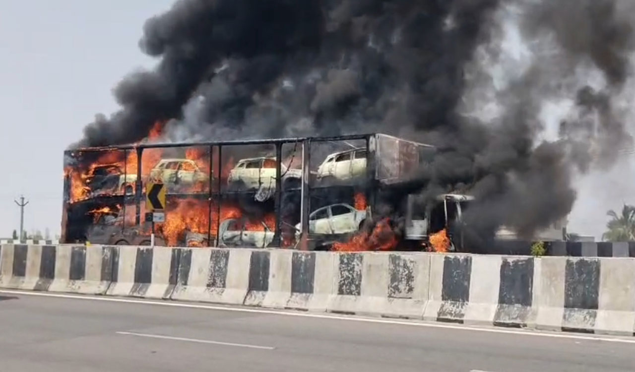 Eight new cars destroyed as container catches fire on NH-44 near Toopran
