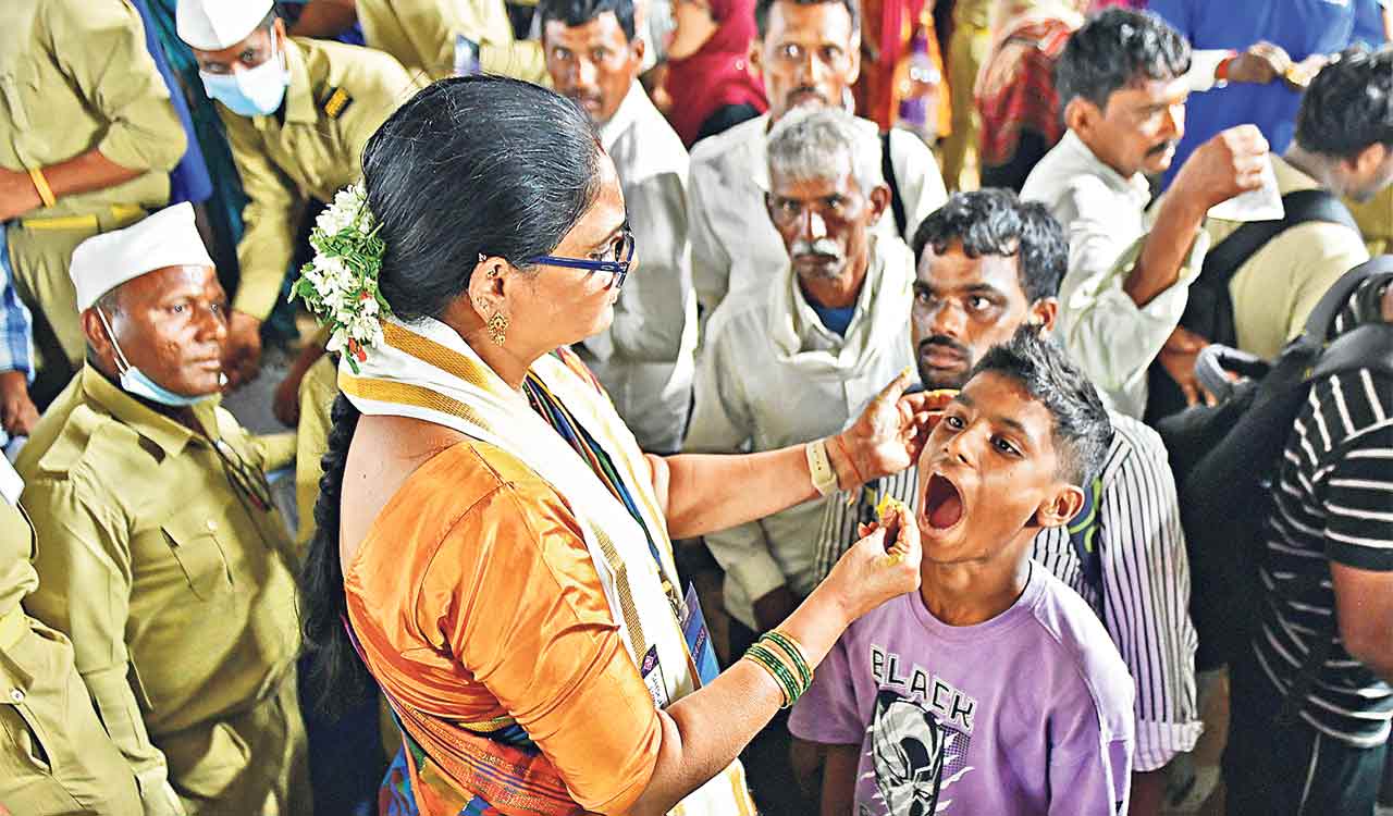 Fish prasadam distribution begins amid massive rush at Nampally Exhibition Grounds