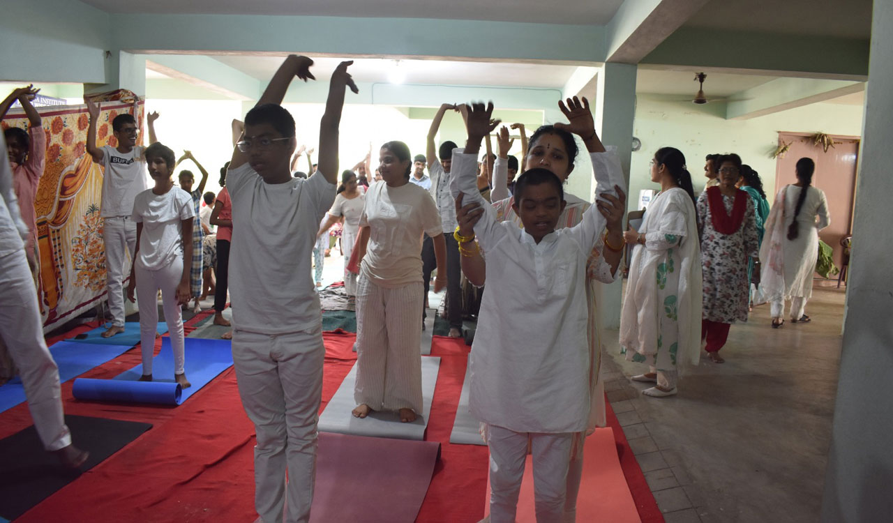 Special children celebrate International Yoga Day with yoga, plantation drive