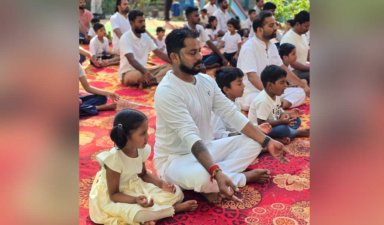 Mancherial students celebrate Yoga with Dad