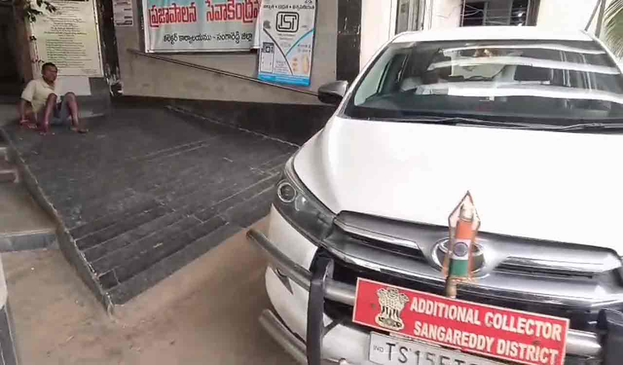 Handicapped persons struggle as Additional Collector car blocks ramp built for them