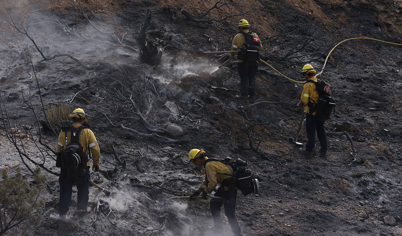 Fast-growing wildfire near US Nevada-California border injures 6, forces 42,000 to evacuate