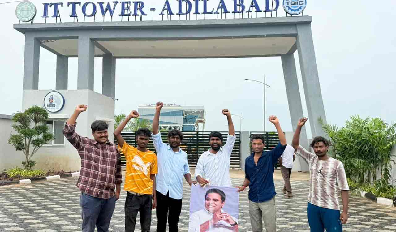 Youngsters perform Ksheerabhisekam to KTR’s flex poster for bringing IT to Adilabad