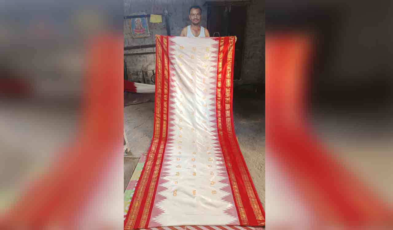 Weaver from Sircilla produces exquisite silk sari featuring 56 Telugu alphabets
