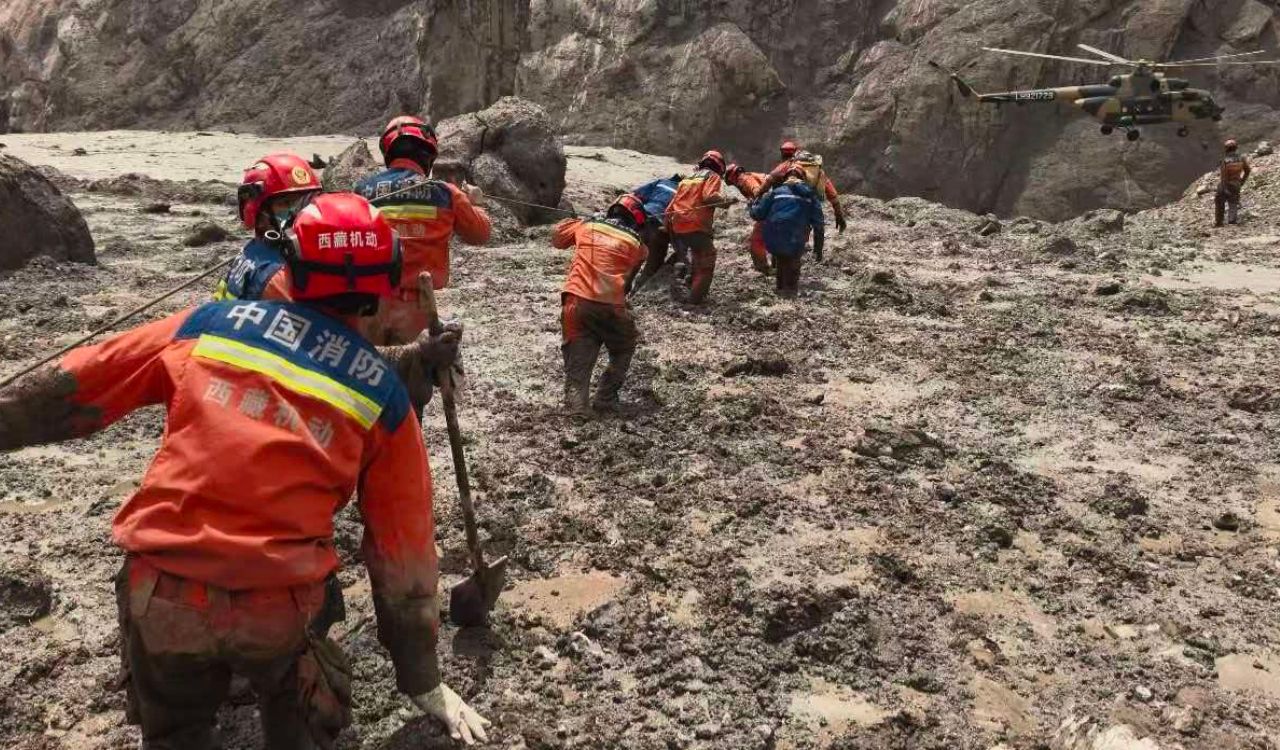 Nepal flood rescuers continue search as identifying dead becomes major challenge