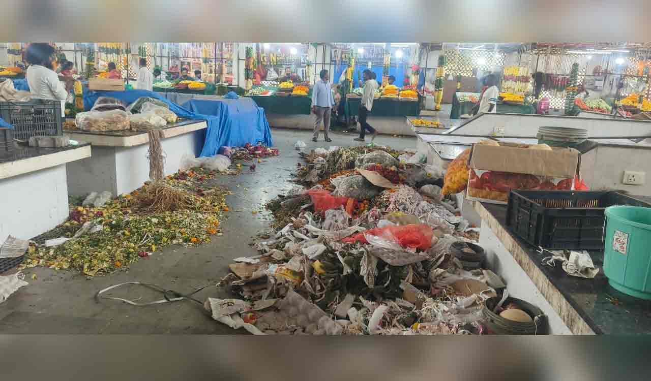 Waste piles up in Gajwel market as workers strike work demanding salaries
