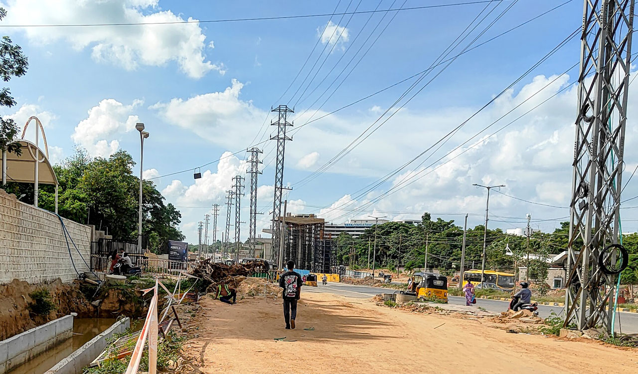 Gachibowli traffic woes: Delayed shifting of power lines bottlenecks IIIT Junction